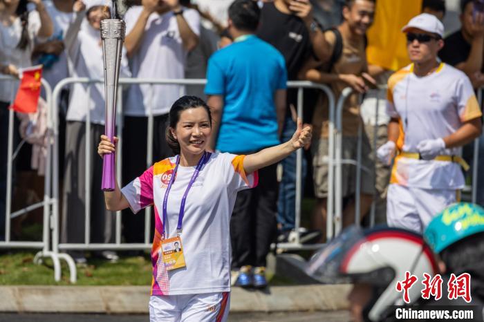 杭州亚运会火炬传递金华站启程 170名火炬手共绘